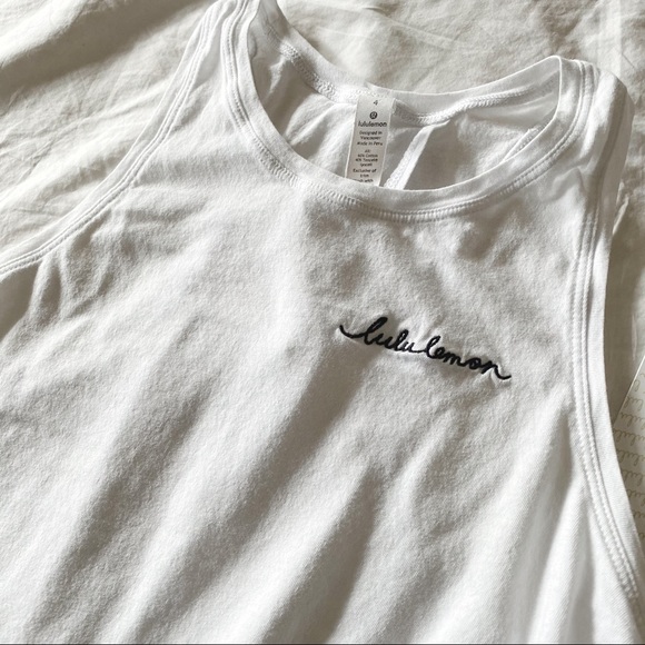 lululemon athletica Tops - NWT Lululemon white tie back tank! Size 4